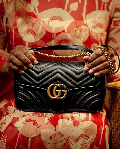 what do the two g's in gucci stand for|gucci gg logo meaning.